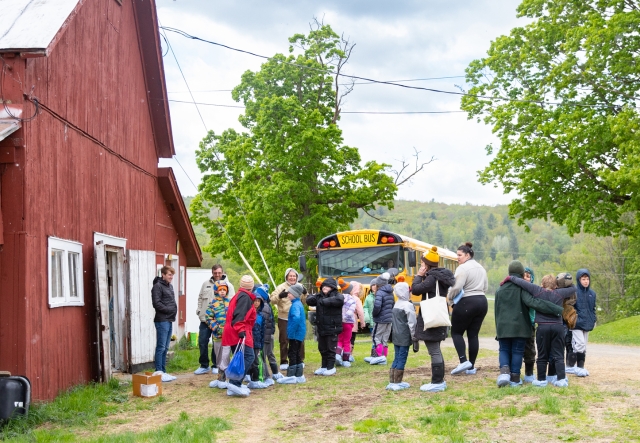 Cambridge Elementary students and their teachers circle up after their arrival to Paul-Lin Dairy in Bakersfield. VT